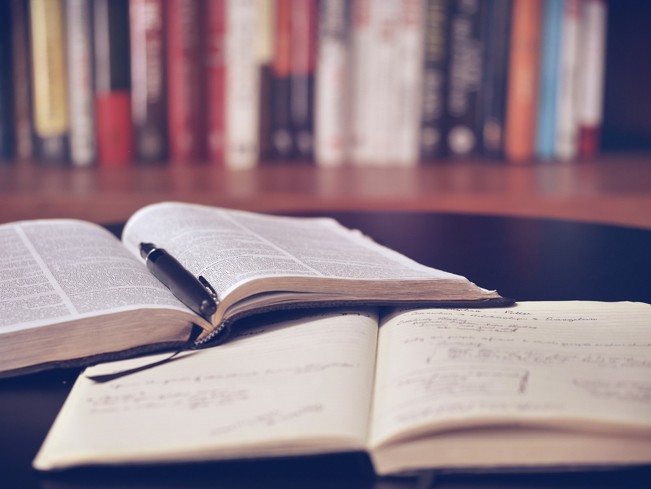 Open books on a table at an outdoor book festival